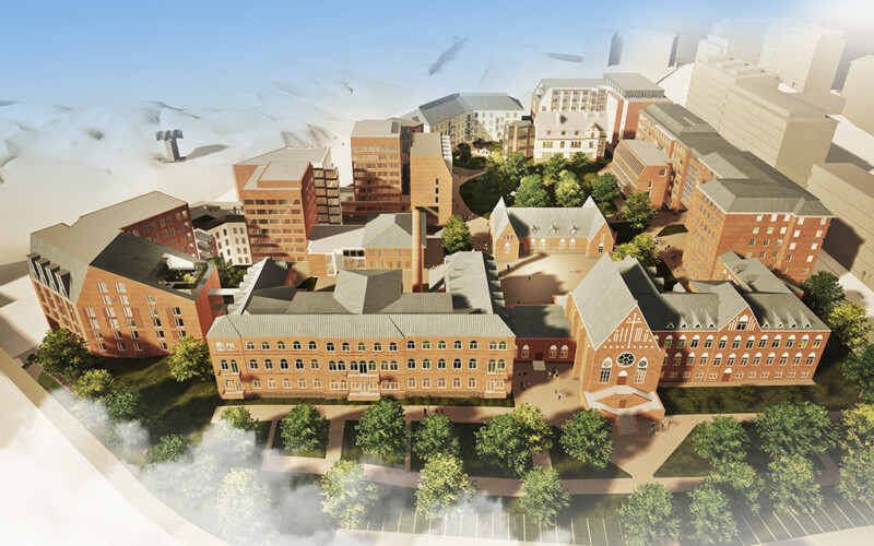 Piirroskuvassa monta punatiilistä rakennusta kuvattuna ilmakuvana.